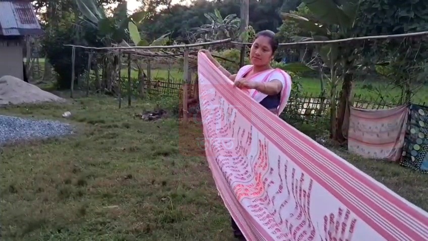 National Handloom Day: Khowang lady weaves nine songs of Zubeen Garg on 25-foot gamucha
