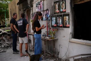 A Divided Israel Marks 2 Years Since October 7 Attack As War In Gaza Grinds On And Hostages Languish People visit the burnt house of Siman Tov family where all five family members were killed during the Hamas attack on Oct. 7, 2023, in Kibbutz Nir Oz, Israel, a day before Israel marks the two-year anniversary of the attack, Monday, Oct. 6, 2025.