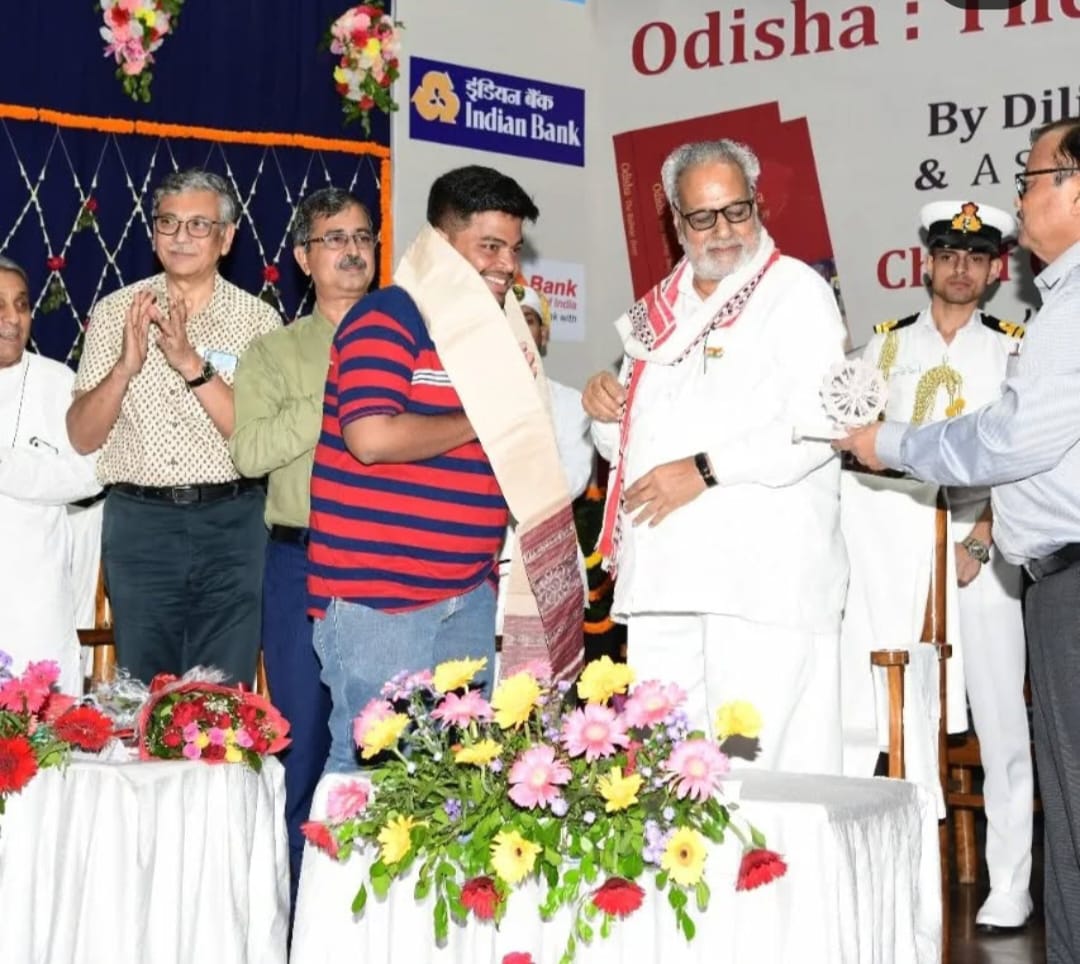 Vishnu Mohan Adhikari being felicitated by Odisha's former governor Ganeshi Lal