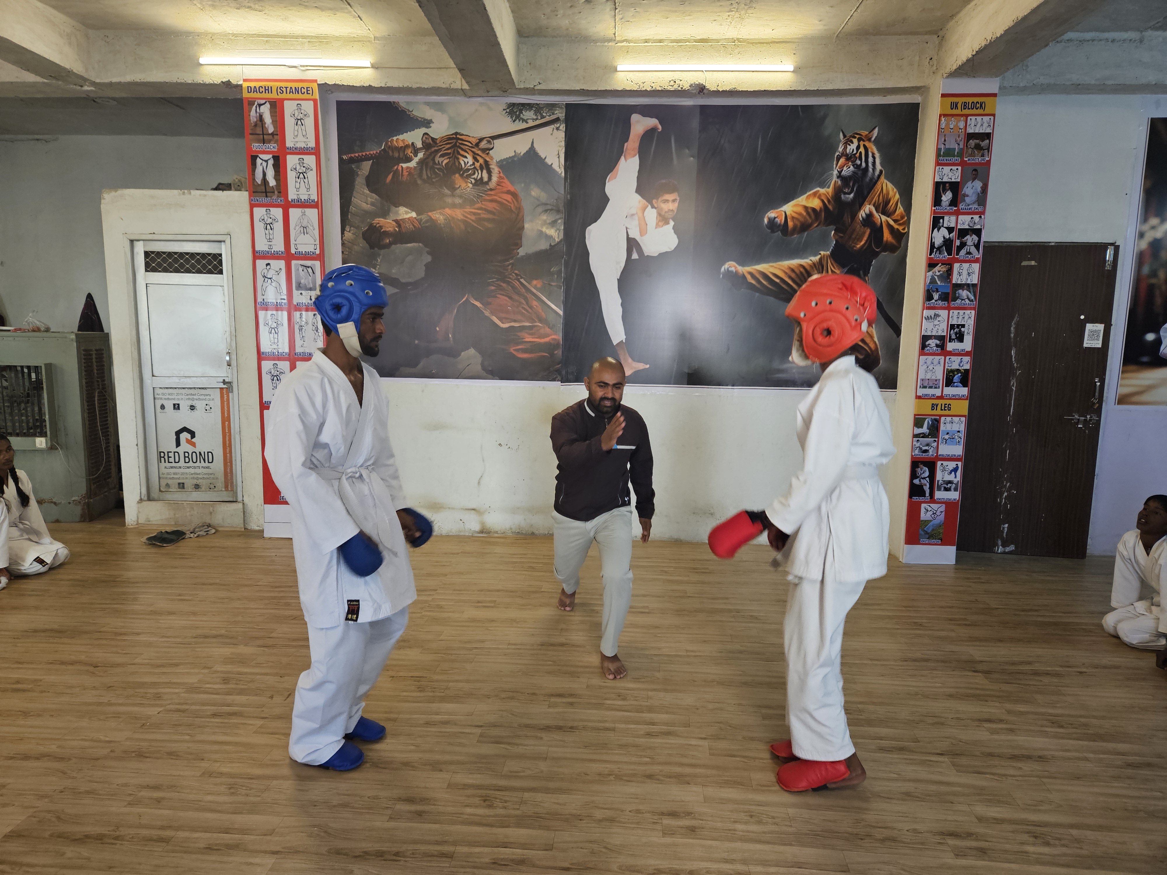 Coach Bharat Pannu shows a stunt to the trainees