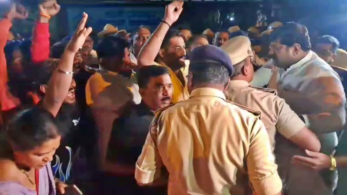 Police take protesters into custody