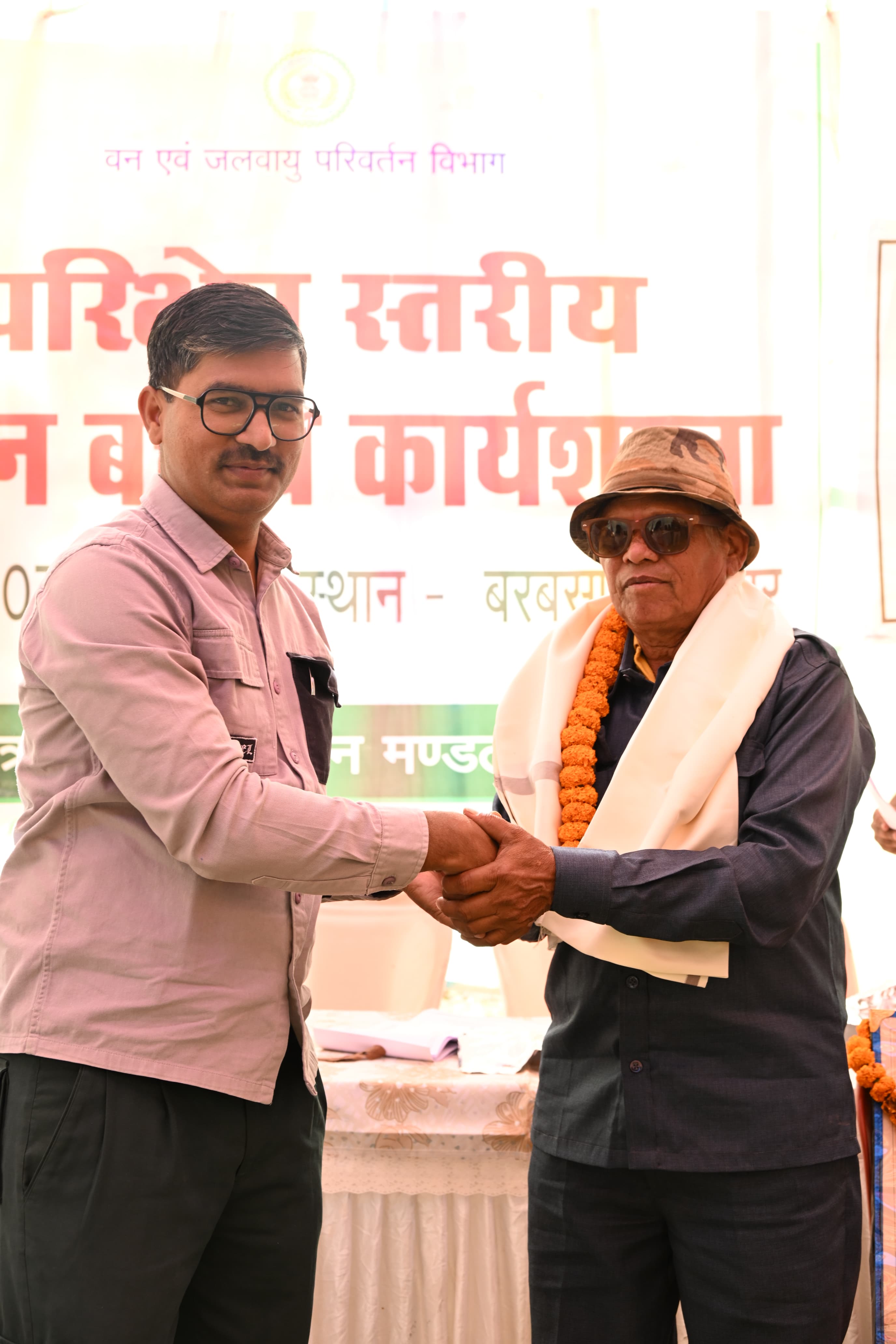 Forest Officer Dhammasheel Ganveer distributing awards