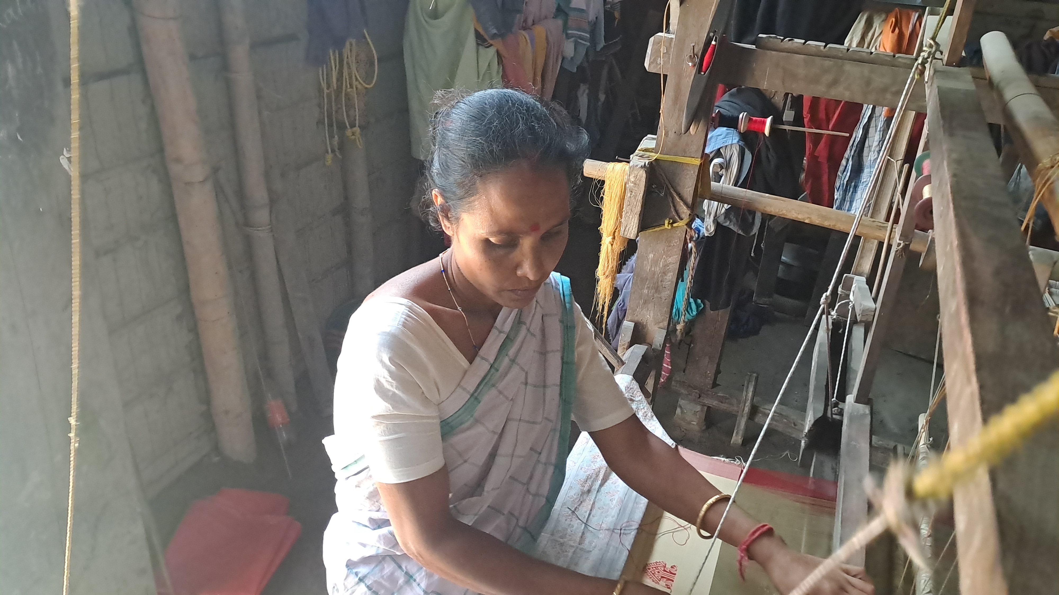 The weavers of a village in Nalbari feed their families by weaving clothes