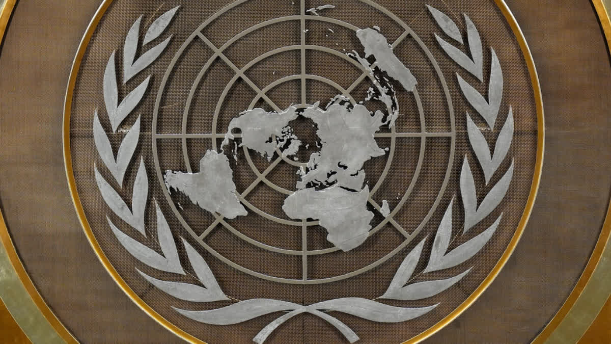 FILE - The United Nations logo is seen inside the 79th session of the United Nations General Assembly, Tuesday, Sept. 24, 2024.