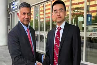 In this image received on May 3, 2026, India's Ambassador to China-designate Vikram Doraiswami, left, is welcomed by Li Jianbo, Deputy Director of the Asia Department of the Chinese Foreign Ministry, on his arrival, in Beijing, China.