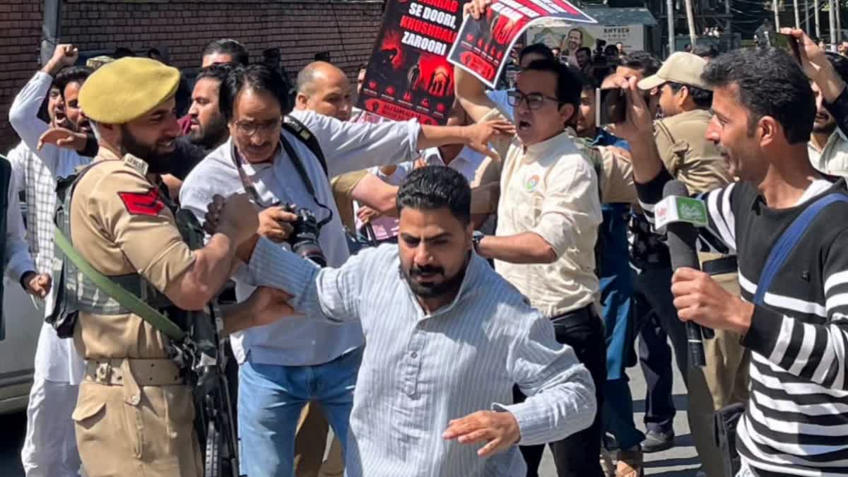 Jammu Kashmir BJP's Sajid Yousuf during a protest against liqour sale in Srinagar.
