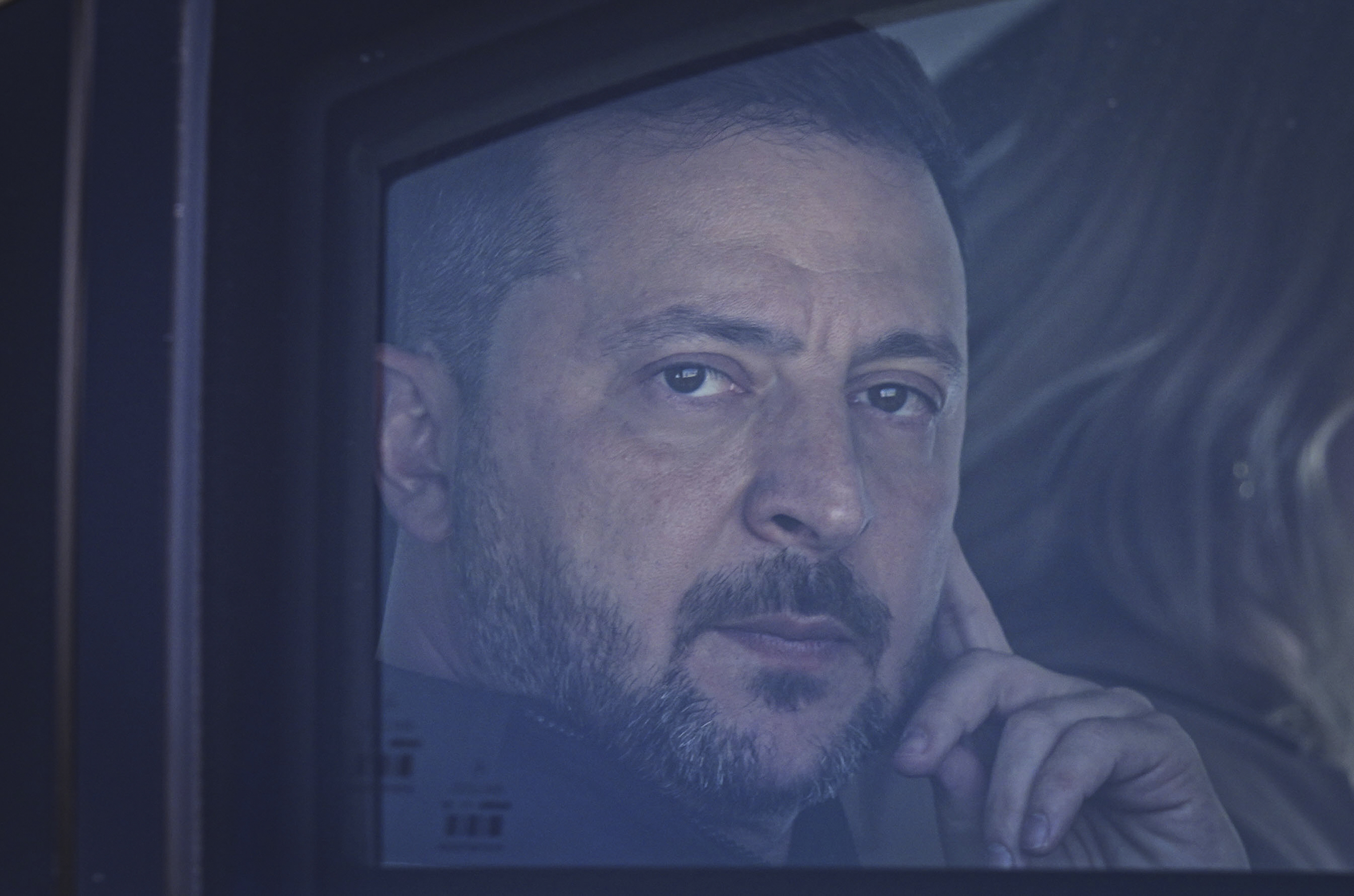 Ukraine's President Volodymyr Zelenskyy looks out from his car window as he arrives for the NATO Summit in Ankara, Turkey, Tuesday, July 7, 2026.