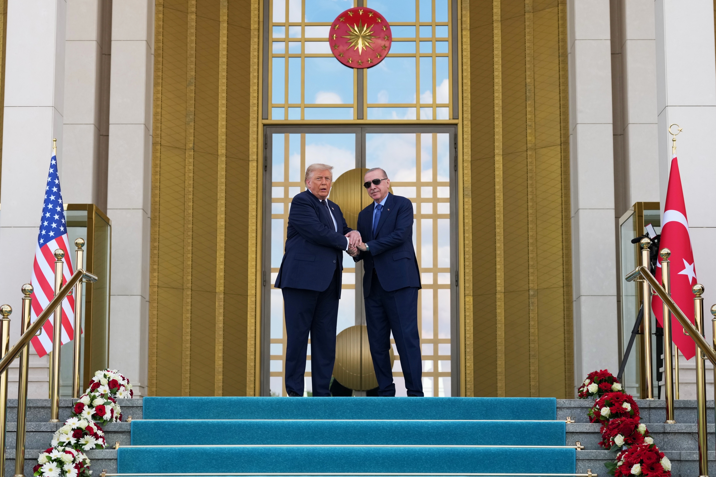 President Donald Trump shakes hands with Turkish President Recep Tayyip Erdogan at the Bestepe Presidential Palace during a formal welcome for the NATO summit in Ankara, Turkey, Tuesday, July 7, 2026.