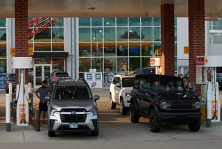 Customer fill up their vehicle's tank at a gas station in Buffalo Grove, Thursday, June 25, 2026.