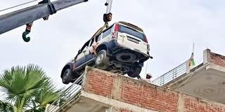 Bihar Scorpio owner parked vehicle on roof top fearing theft