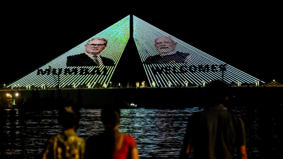 ealink display with portraits of Prime Minister Narendra Modi and United Kingdom Prime Minister Keir Starmer on the eve of latter's visit to Mumbai