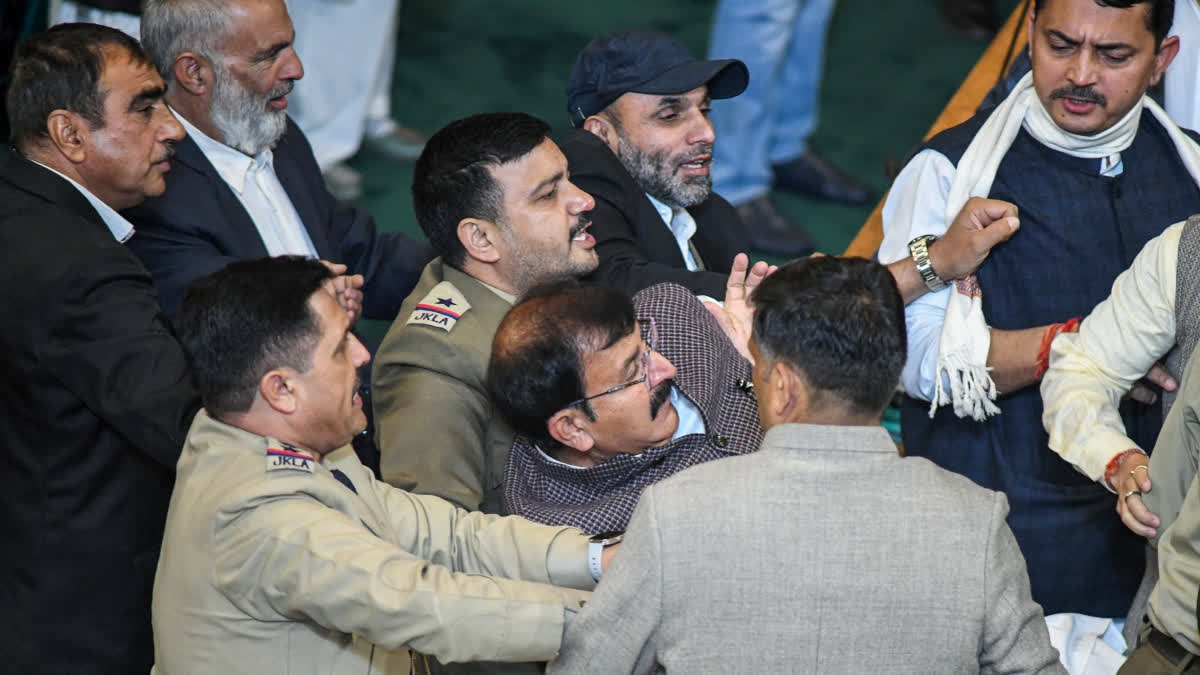 Ruckus in JK Assembly on Third Consecutive Day Over Special Status Resolution JK Assembly witnessed chaos as BJP MLAs protested by jumping into the well of the House over a special status resolution, leading to their eviction.