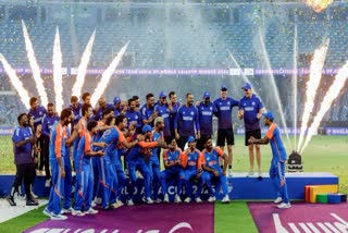 Indian players and team staff celebrate Asia Cup 2025 triumph over Pakistan without the trophy after the Indian team refuses to accept the trophy from Pakistan minister and ACC president Mohsin Naqvi
