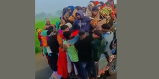 Passengers crammed into a jeep in Banswara