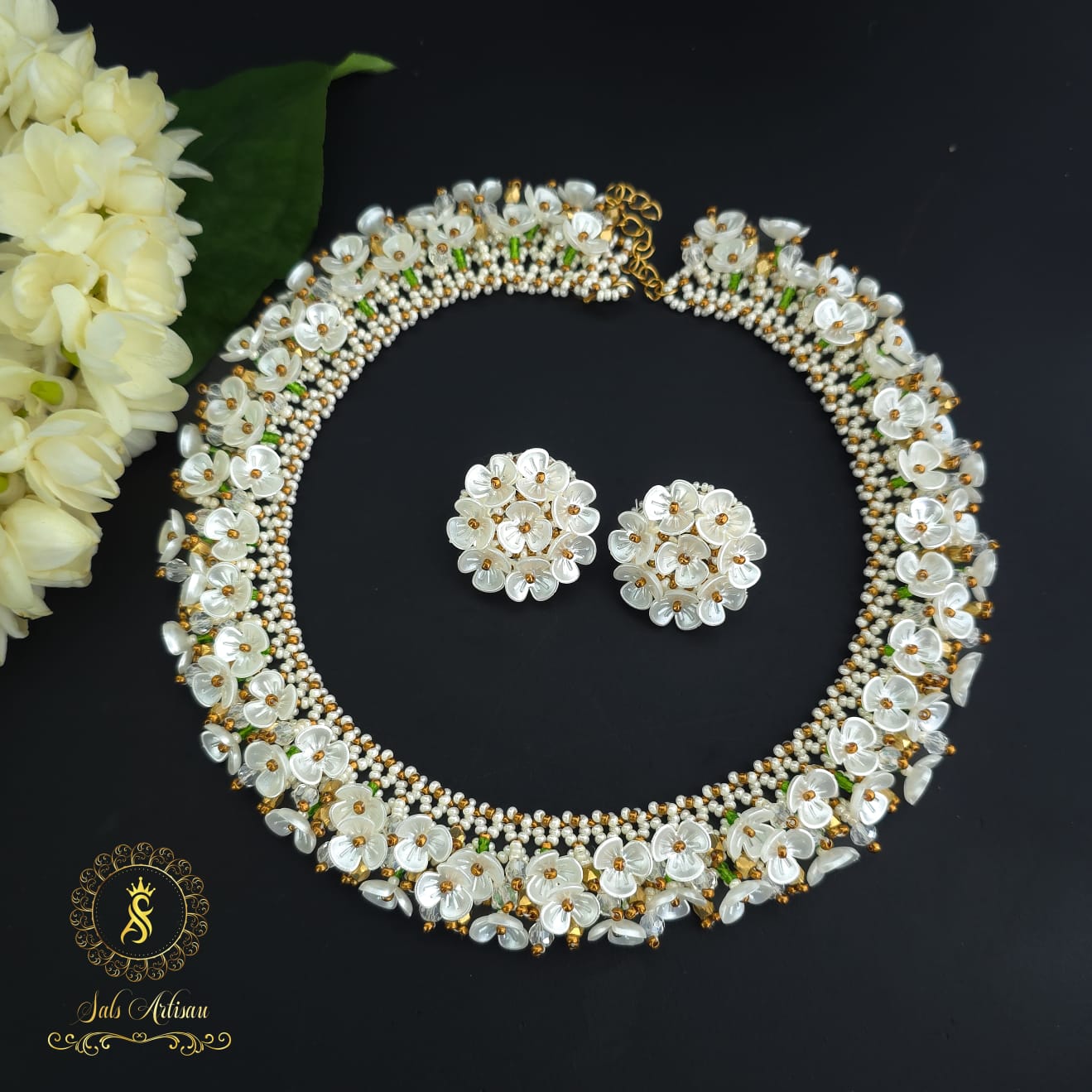 Handcrafted sea bead jewelry Kerala woman entrepreneur story Customised beadwork accessories Salsartisau instagram page