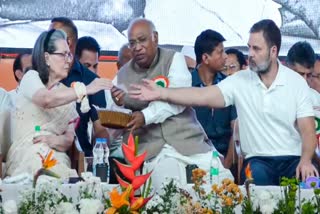 Congress President Mallikarjun Kharge, Congress Parliamentary Party chairperson Sonia Gandhi and Leader of Opposition in Lok Sabha Rahul Gandhi attending the AICC session at the banks of the Sabarmati river, in Ahmedabad.