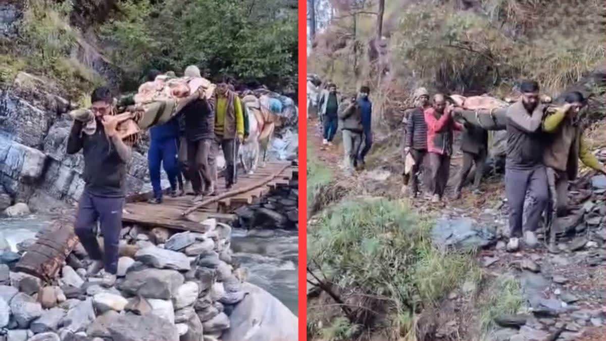 Villagers carry ex-armyman on the makeshift stretcher.