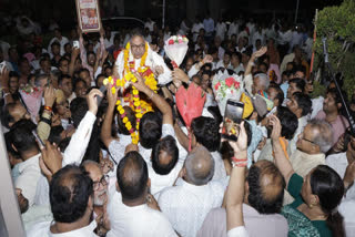 Supporters welcoming Poonia