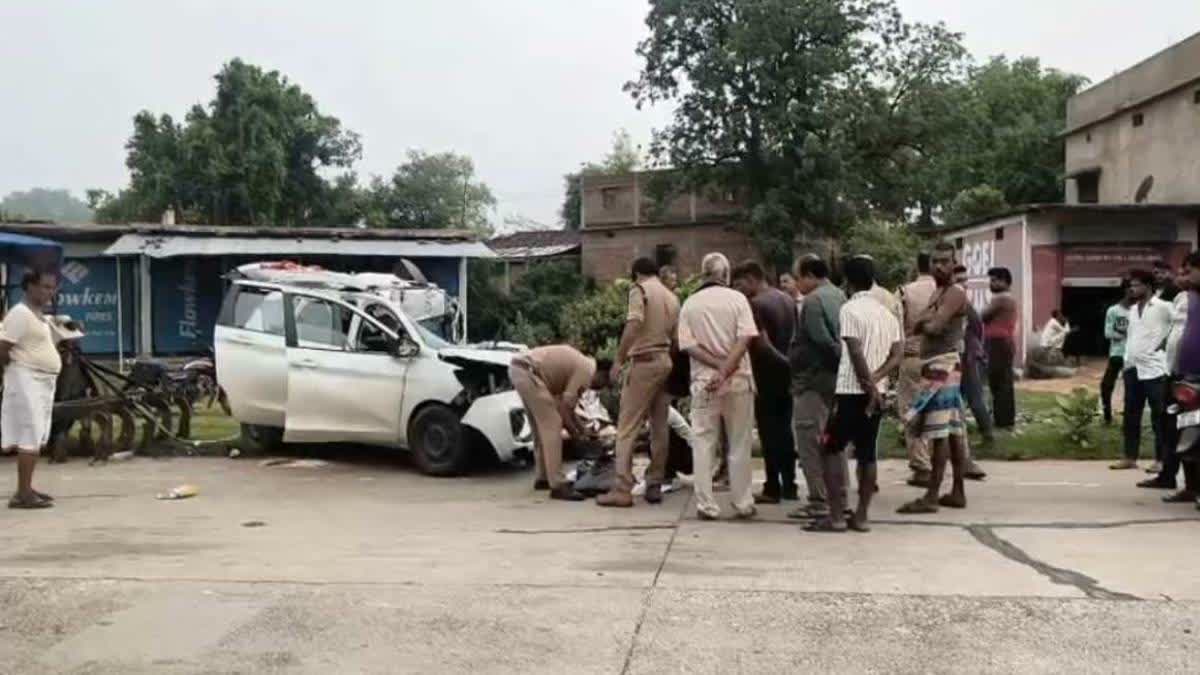 Police inspect the vehicle involed in the accident.