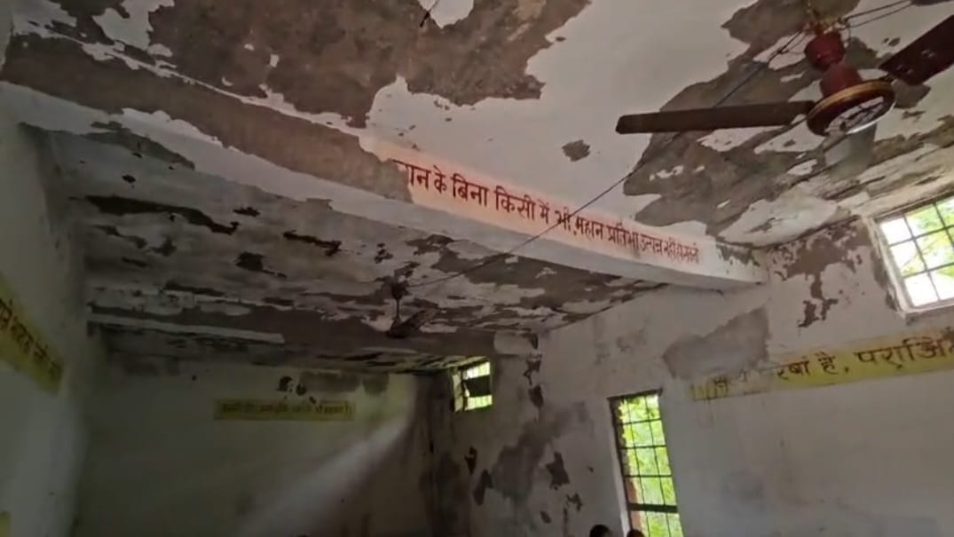 CHILDREN STUDYING LEAKING ROOFS