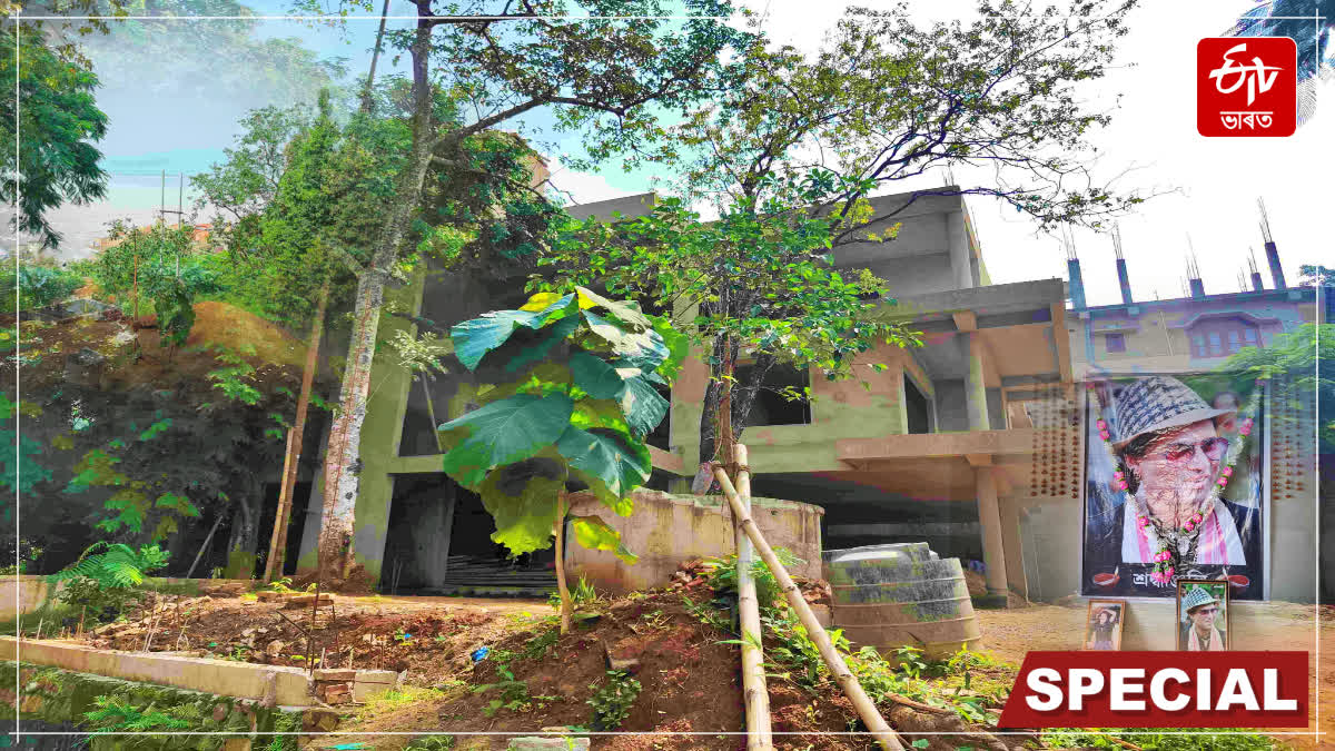 What is the condition of the house under construction in Kharguli belonging to Zubeen Garg