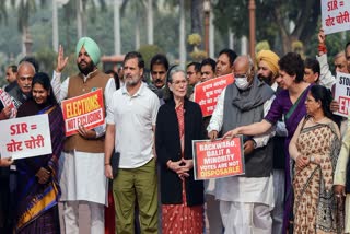 Congress leaders protest against SIR in Parliament premises during the winter session, in New Delhi