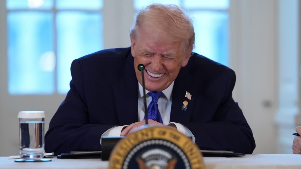 President Donald Trump smiles during a meeting with oil executives in the East Room of the White House, Friday, Jan. 9, 2026, in Washington