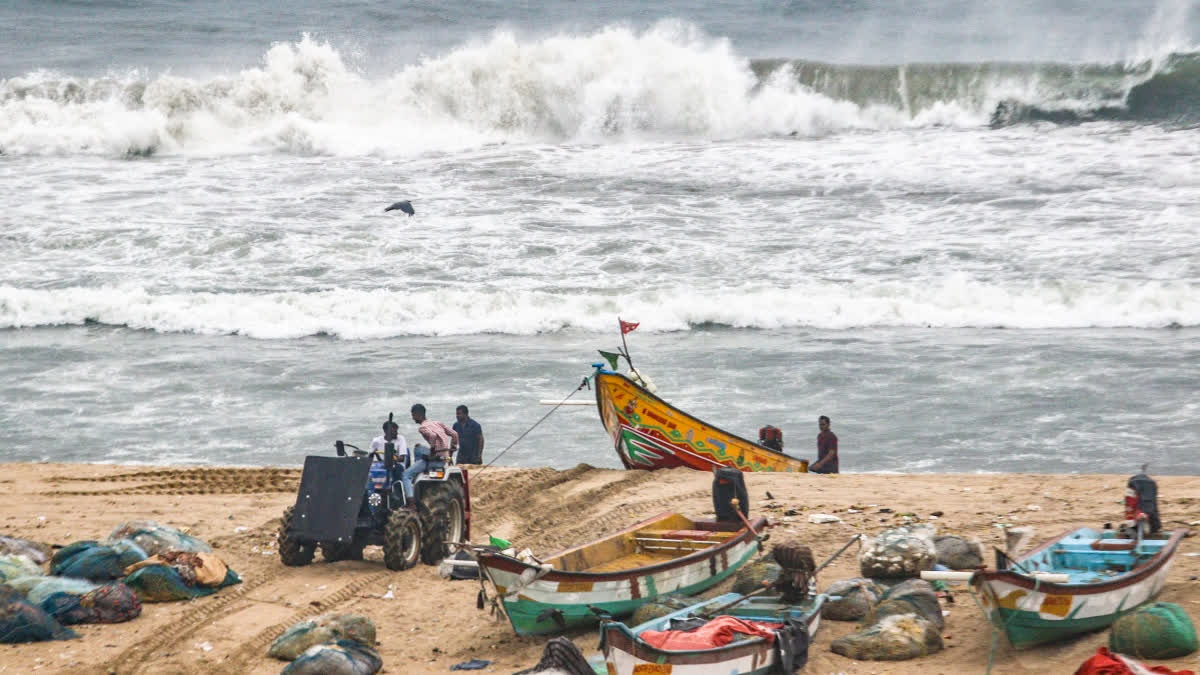Deep Depression To Weaken And Cross Sri Lanka Coast: IMD Fishermen keep their boats ashore and shift them from the Nochikuppam shore during Cyclone Montha, as rough seas and strong winds suspend fishing activities along the coast, in Chennai on Monday, October 27, 2025.