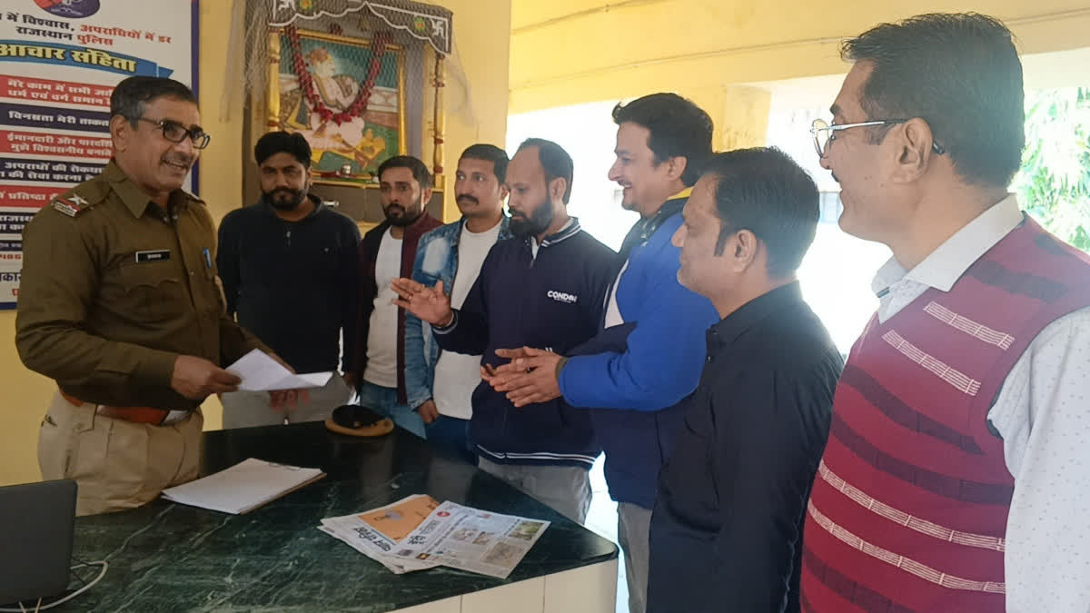 businessman is giving a report to the police officer