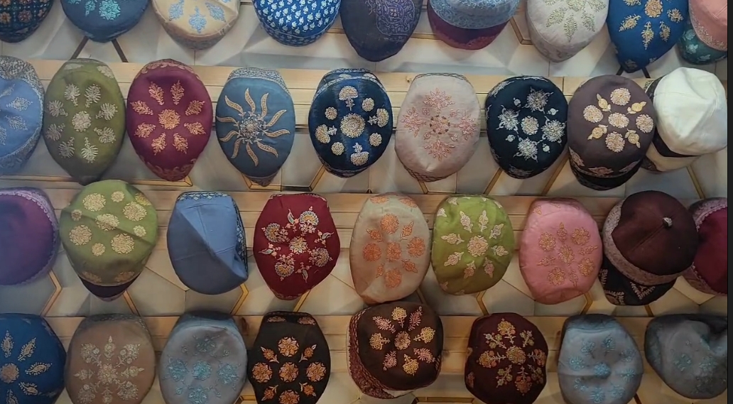 Sozni caps on display at a shop in Srinagar