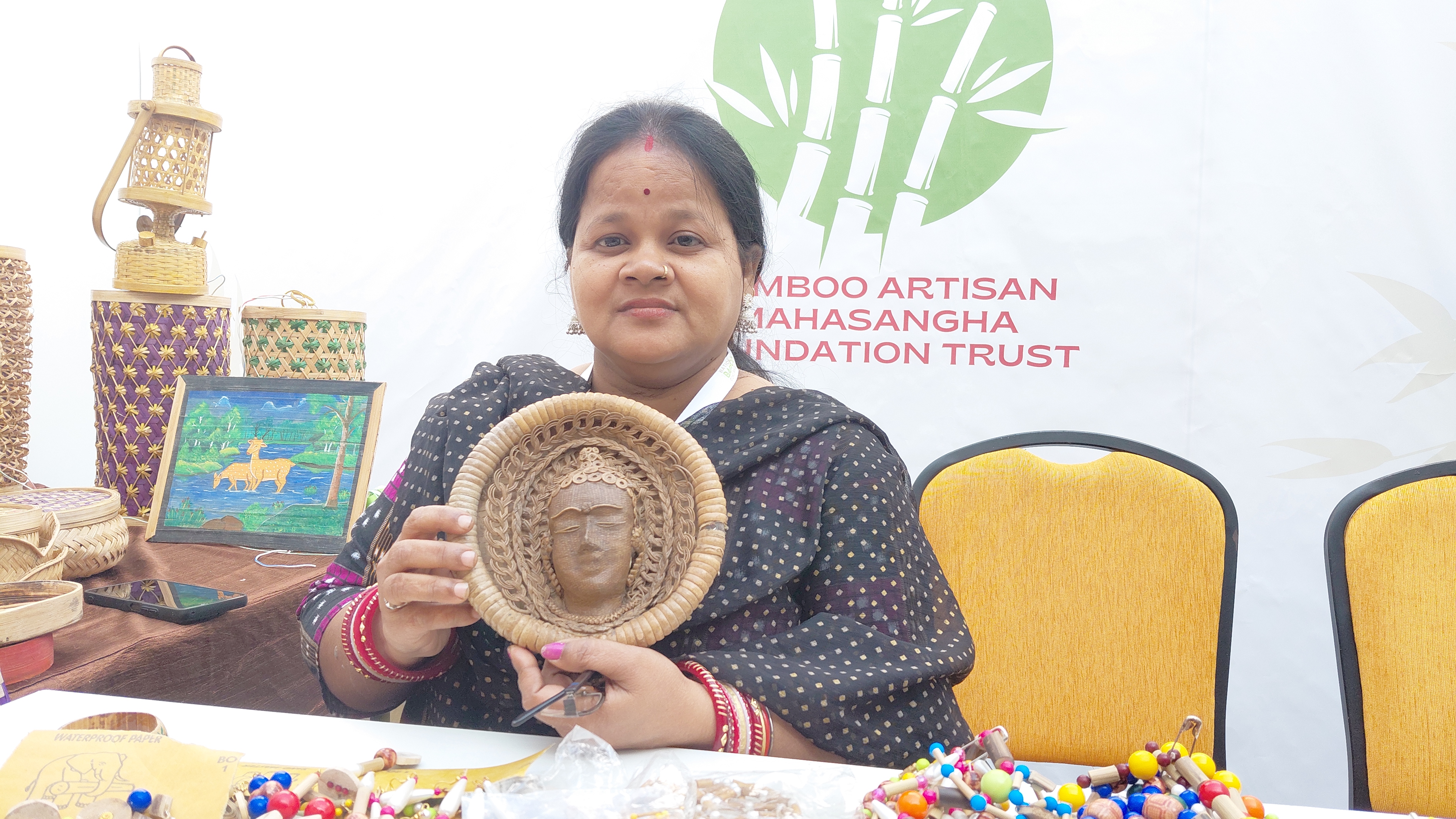 Ekadashi Barik's Wife Sulochana Barik Showing a Statue Made from Bamboo