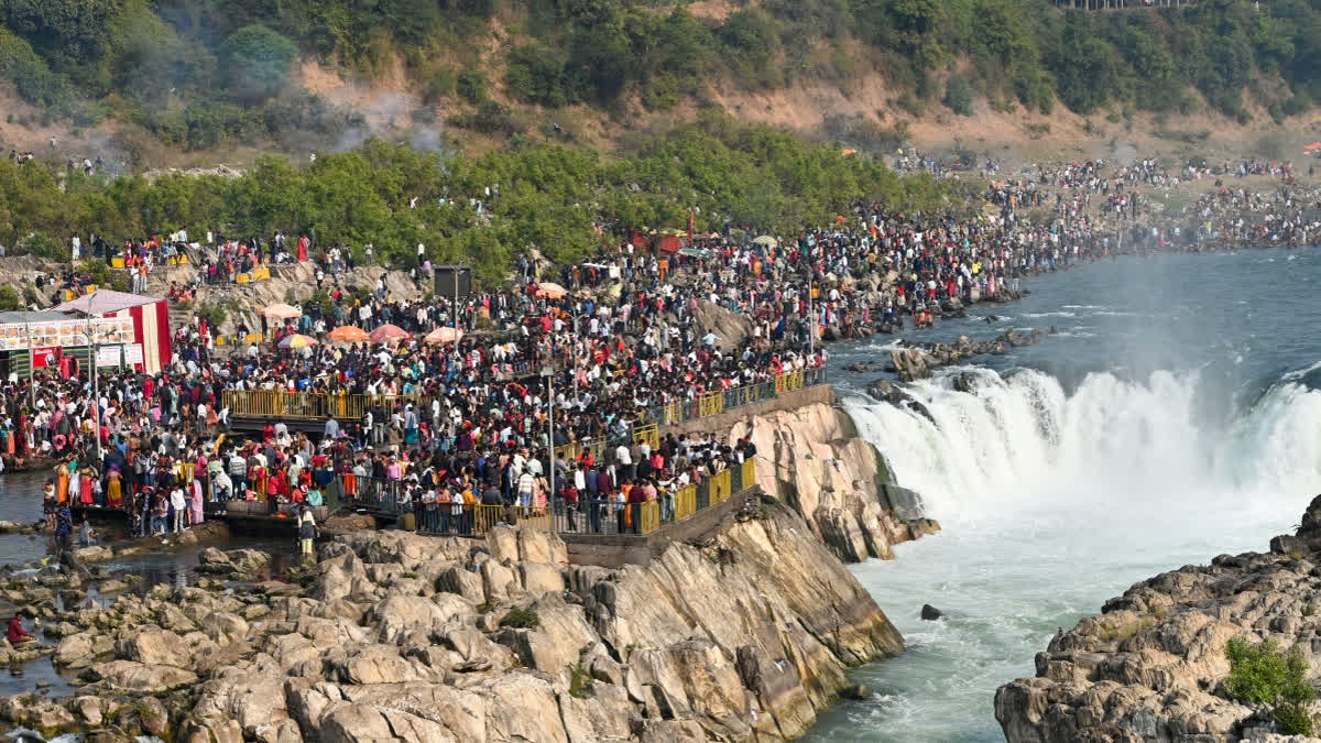 11,000 Litres Of Milk Poured Into Narmada After Religious Event; Environmentalists See Red Visitors crowd around the Marble Rocks waterfall on the Narmada River at Bhedaghat on the outskirts of Jabalpur on New Year’s Day, Thursday, January 1, 2026.