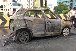 Car Catches Fire on Benz Circle in Vijayawada