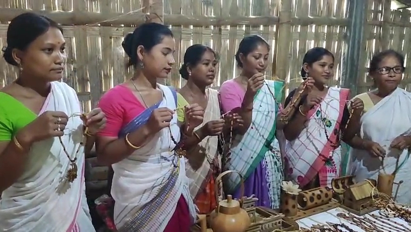 women creating attractive jewelry from natural materials