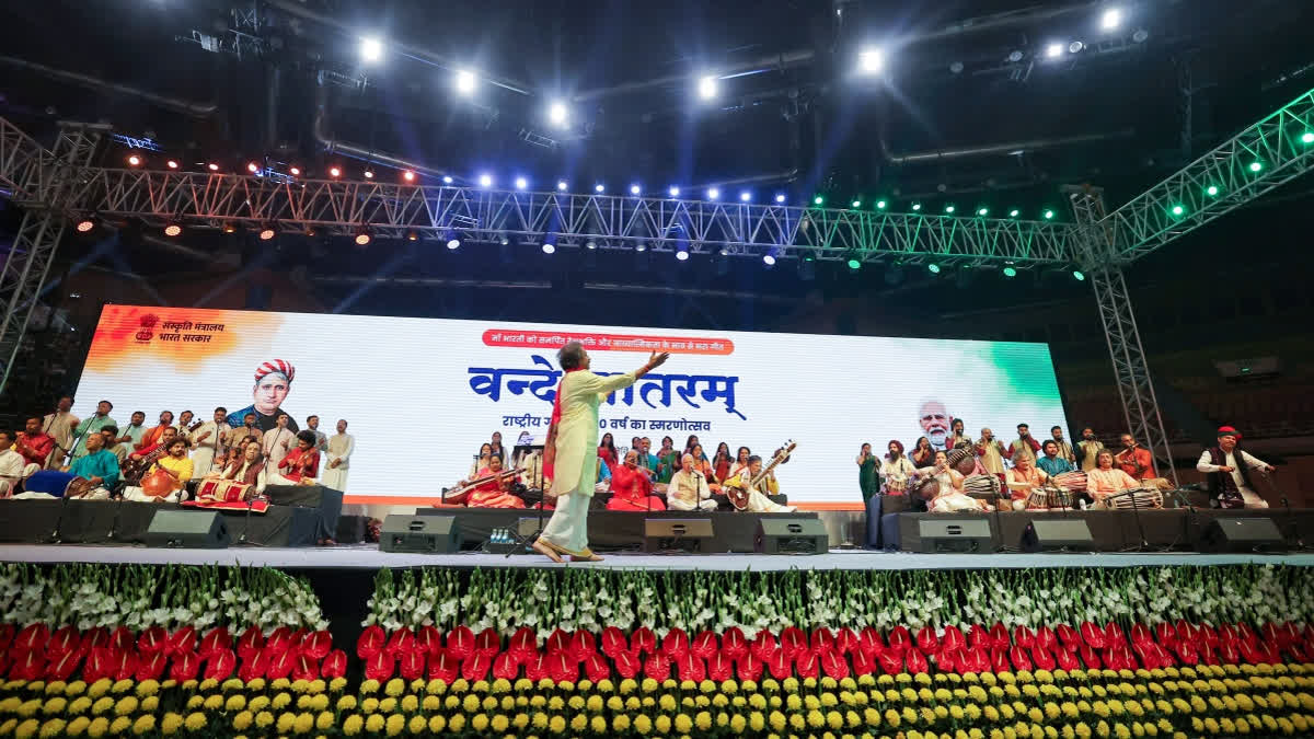 Artists perform and sing the National Song “Vande Mataram” during the event inaugurated by Prime Minister Narendra Modi at the Indira Gandhi Indoor Stadium, in New Delhi on November 7, 2025.