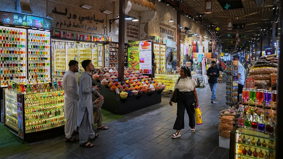 People walk through the Grand Souk Deira in Dubai, United Arab Emirates, Tuesday, March 10, 2026.
