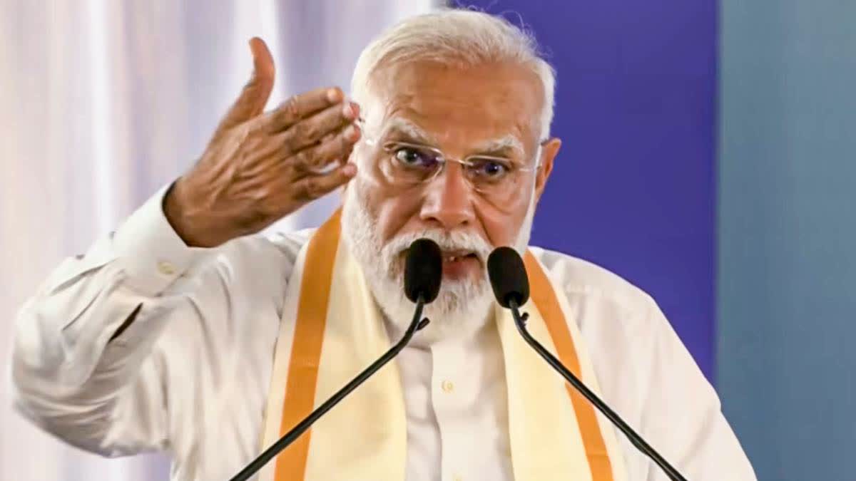 PM Modi addresses the gathering during the Golden Jubilee Sammelan of Akhila Kerala Dheevara Sabha in Kochi on Wednesday.