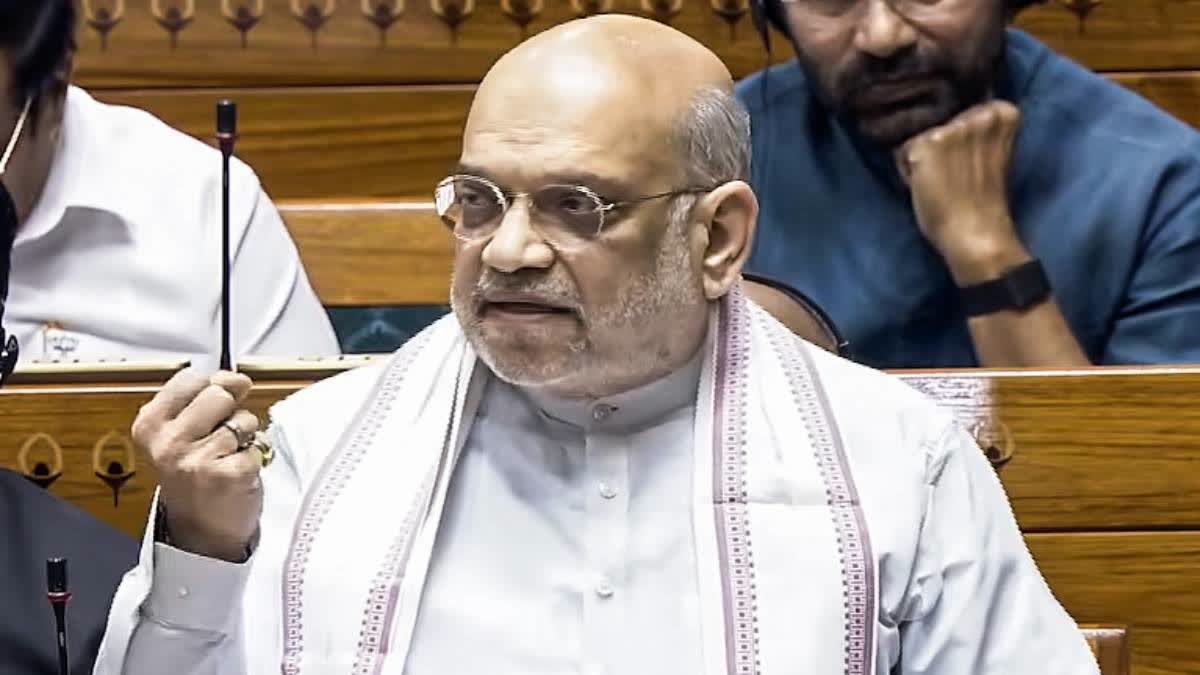 Home Minister Amit Shah speaks on motion to remove Speaker Om Birla in Lok Sabha on Wednesday.