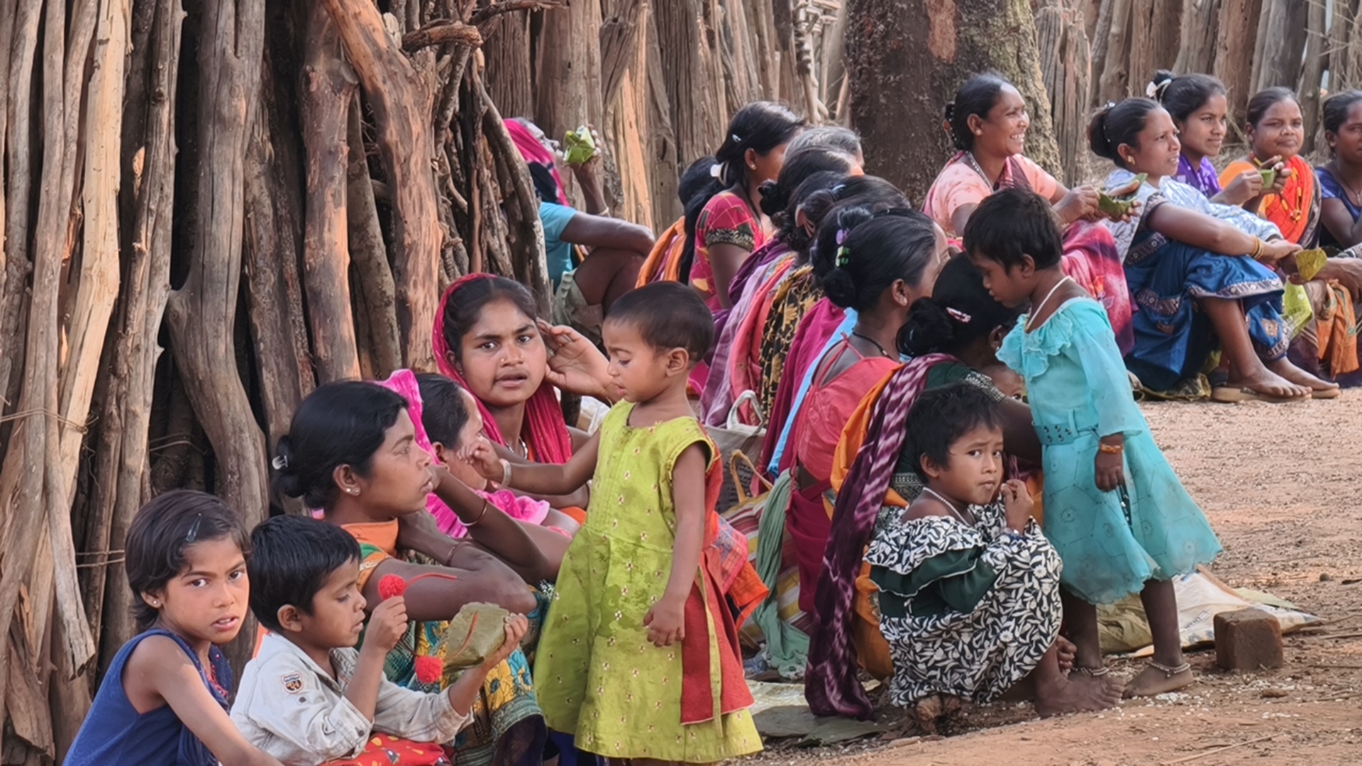 Children see the reconstruction of Ghotul in Jharawahi village.