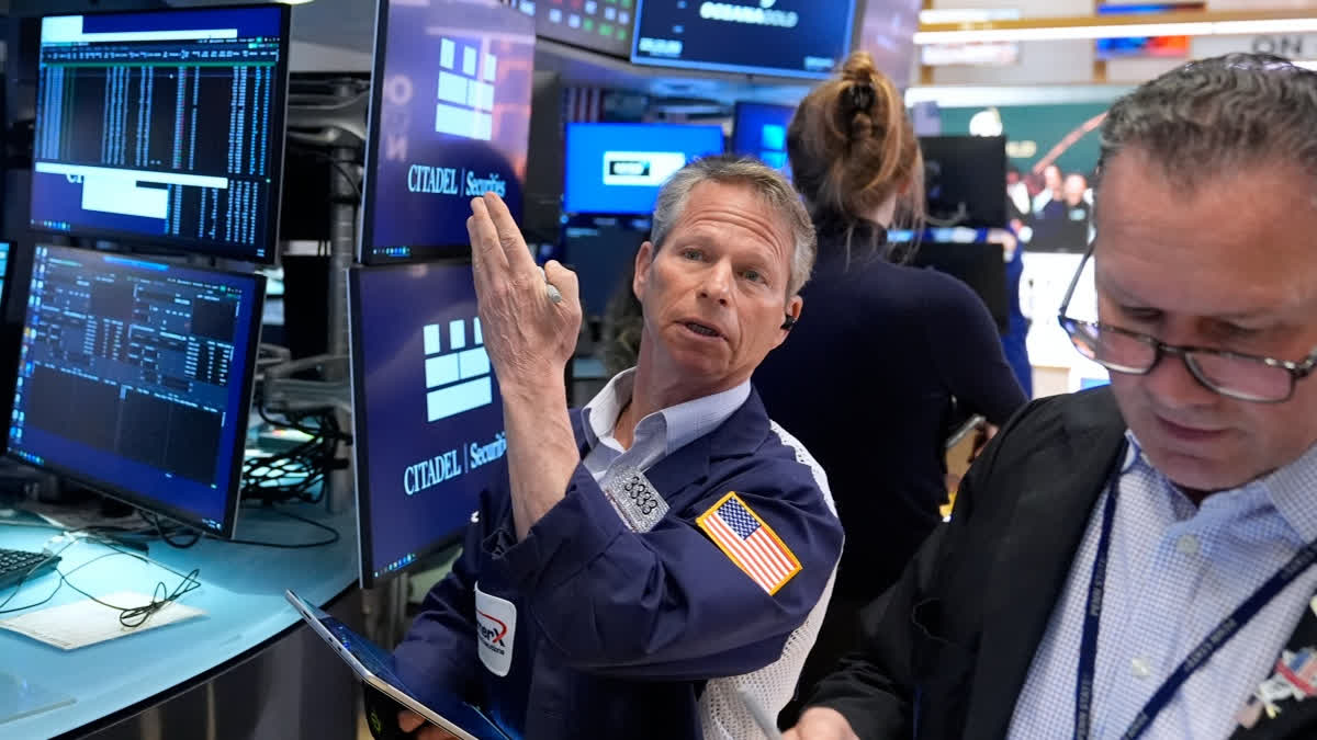Bobby Charmak works on the floor at the New York Stock Exchange in New York, Tuesday, April 7, 2026.