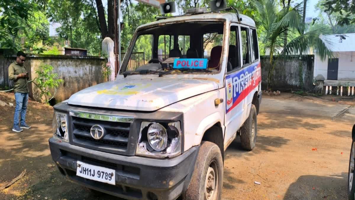 Police vehicle damaged in attack
