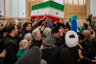 In this photo released by Iran's Supreme Leader's office, mourners carry the coffin of the late Iranian Supreme Leader Ayatollah Ali Khamenei above the crowd for the final prayer before his burial at the Imam Reza Shrine in Mashhad, northeastern Iran, Thursday, July 9, 2026.