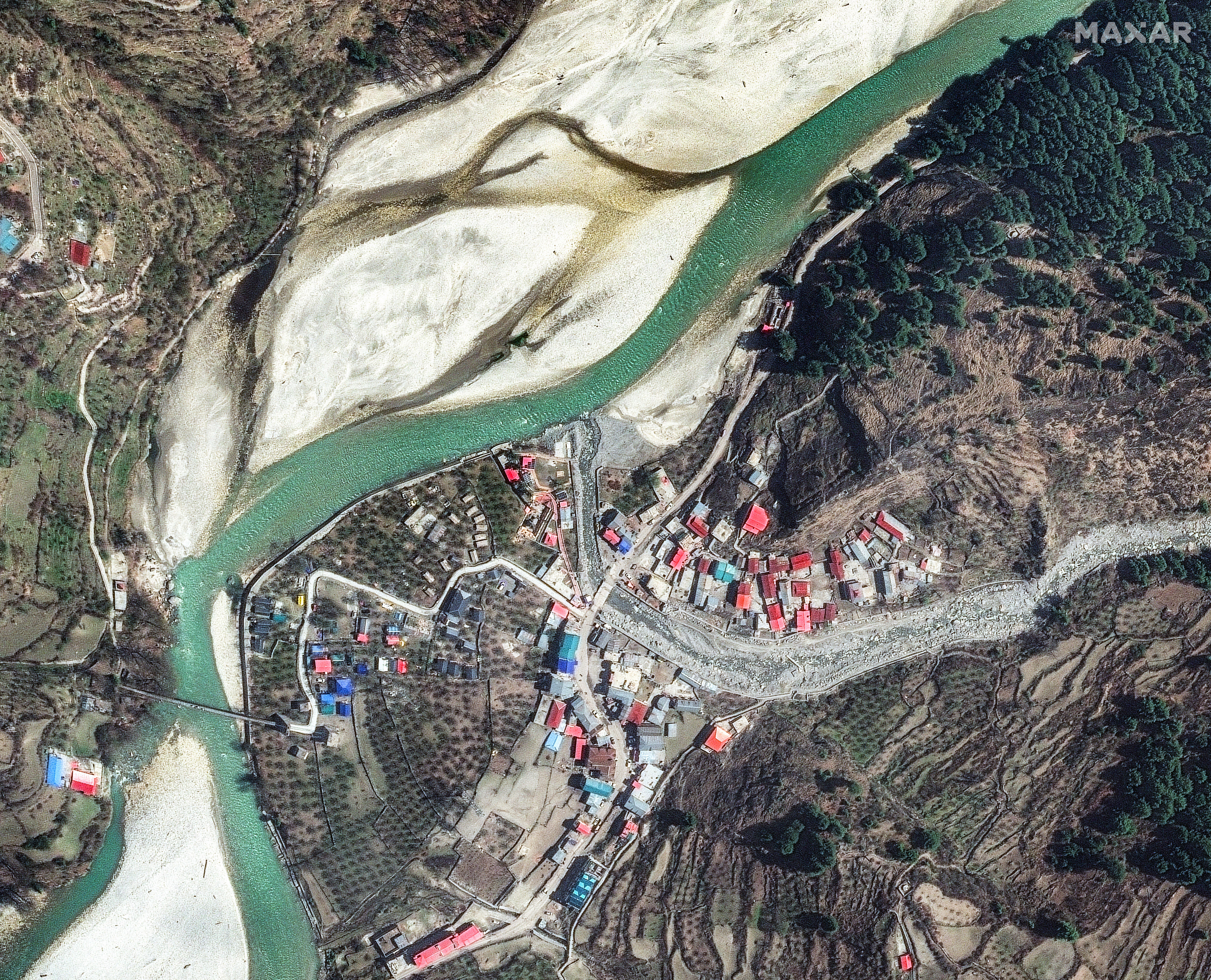This satellite image provided by Maxar Technologies shows village before a landslide in Uttarakhand, India, on April 11, 2025.