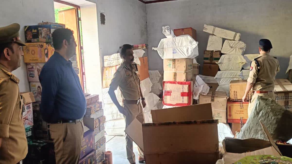 Police during the raid at a godown.
