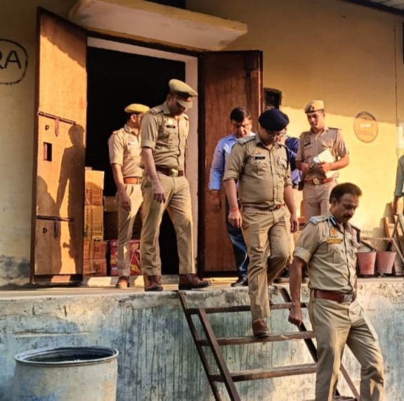 Police during the raid at a godown.