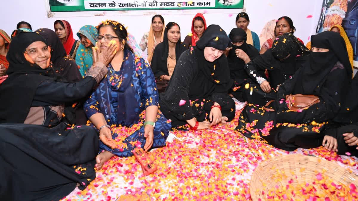 Muslim women in Varanasi joined Holi festivities, applying gulal and singing folk songs, showcasing Ganga-jamuni culture and reinforcing unity.