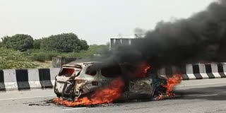 Fierce flames erupting from the car