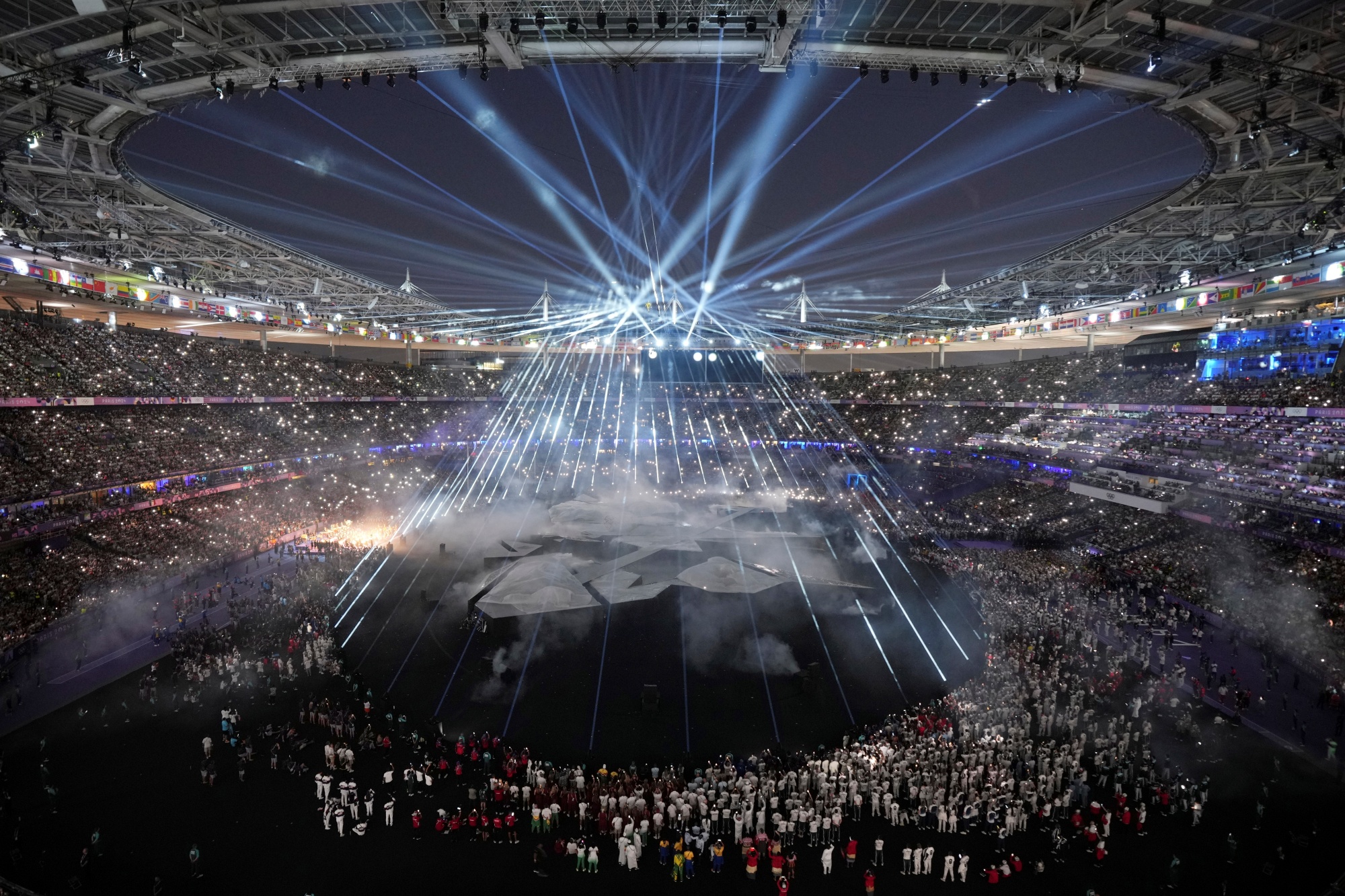 Participants attend the 2024 Summer Olympics closing ceremony at the Stade de France, Sunday, Aug. 11, 2024, in Saint-Denis, France.