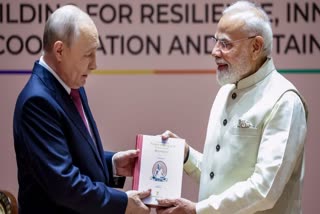PM Modi gifts Putin thiruvalluvar book