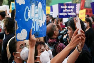 Residents of Delhi protest at India Gate demanding government action and policies to curb rising air pollution levels in the National Capital Region, in New Delhi on Sunday, November 9, 2025.